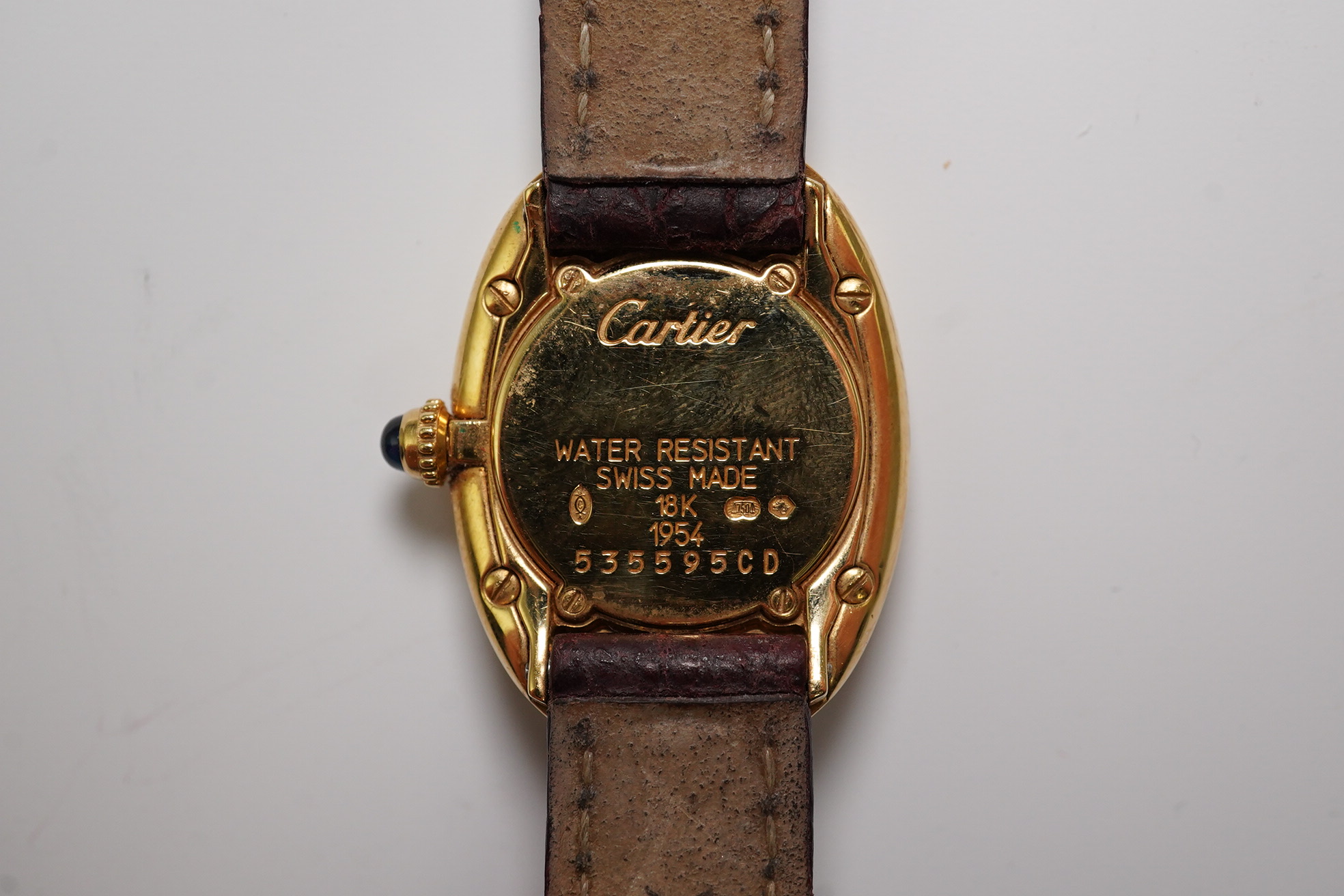 A lady's 2000 18ct gold Cartier Baignoire quartz wrist watch, on a Cartier leather strap